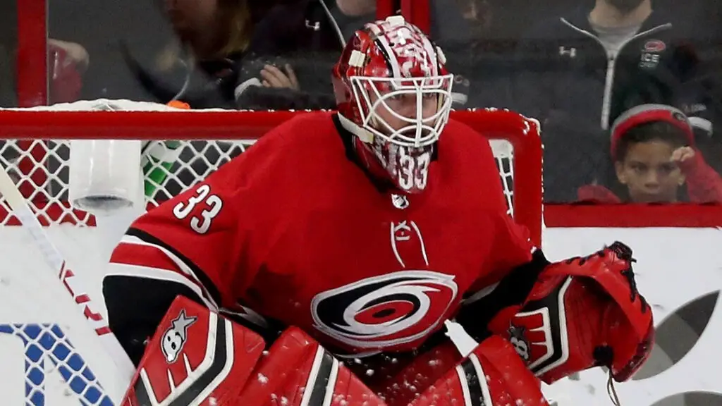 Carolina Hurricanes goaltender Scott Darling crouches in the crease during an NHL game against the Columbus Blue Jackets