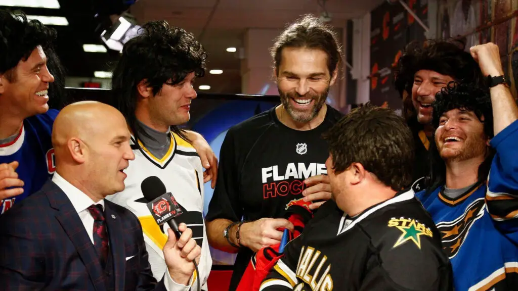 Calgary Flames player Jaromir Jagr surprises the Traveling Jagrs during the intermission of the game against the Winnipeg Jets
