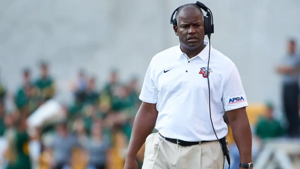 Former Liberty Flames head coach Turner Gill looks on against the Baylor Bears during a football game