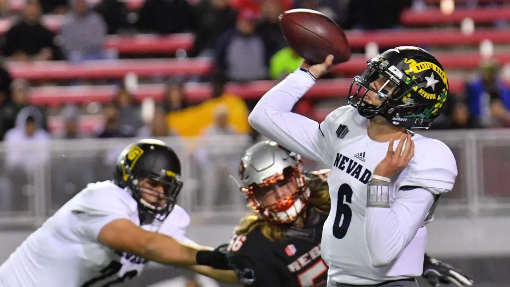 Nevada Wolf Pack quarterback Ty Gangi looks to throw the football against the UNLV Rebels during their game 