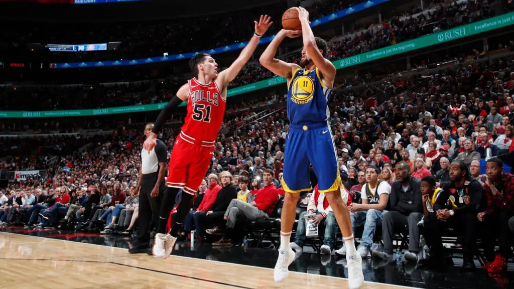 Golden State Warriors star Klay Thompson shoots a three-pointer during the game against the Chicago Bulls