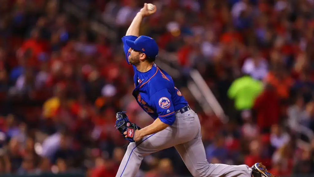 New York Mets pitcher Matt Harvey delivers a pitch against the St. Louis Cardinals