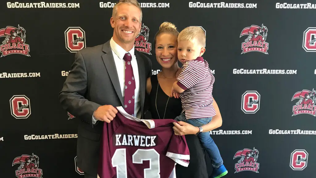 New Colgate Raiders head coach Matt Karweck during his introductory press conference with his family