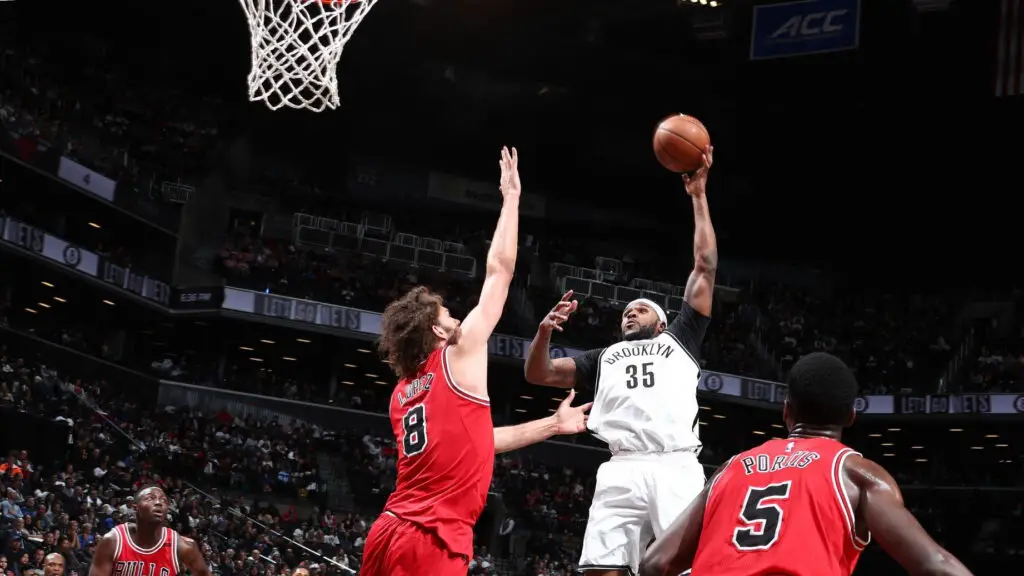 Brooklyn Nets player Trevor Booker shoots the ball against the Chicago Bulls during the game