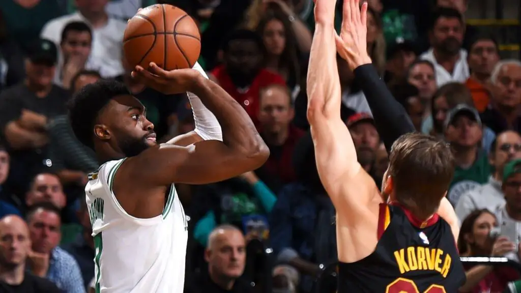 Boston Celtics player Jaylen Brown shoots the ball against the Cleveland Cavaliers during Game Seven of the Eastern Conference Finals of the 2018 NBA Playoffs between the Cleveland Cavaliers and Boston Celtics