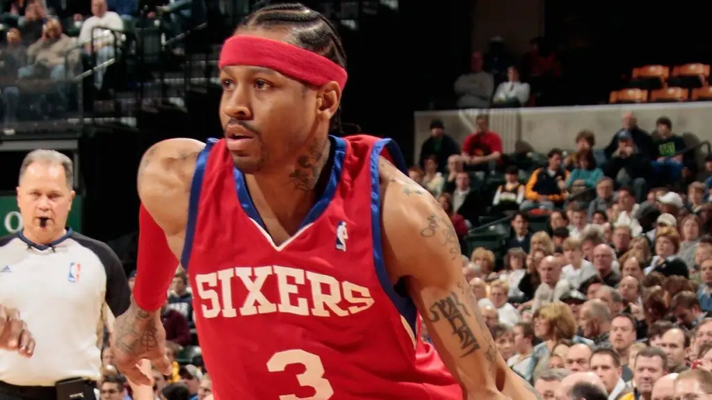 Former Philadelphia 76ers guard Allen Iverson drives to the basket against the Indiana Pacers during a game