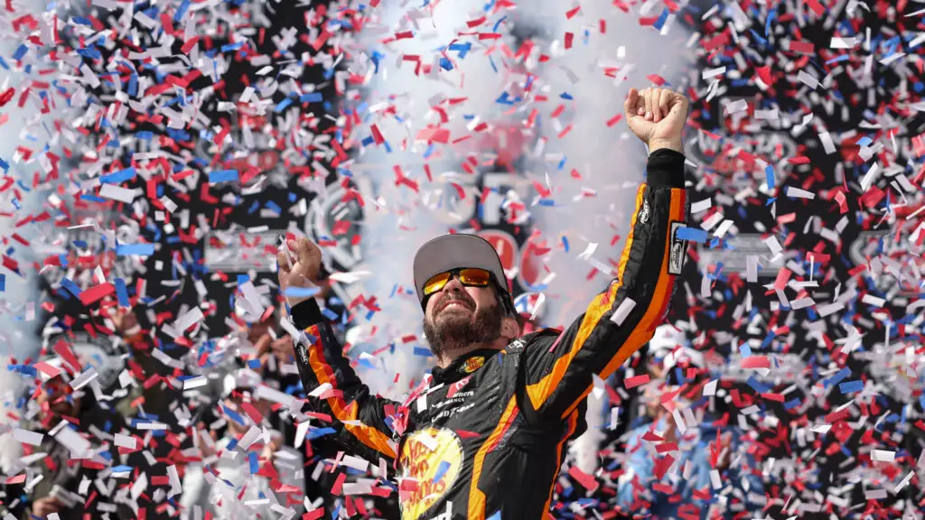NASCAR Cup Series Bass Pro Shops driver Martin Truex Jr. celebrates in victory lane after winning the NASCAR Cup Series Würth 400