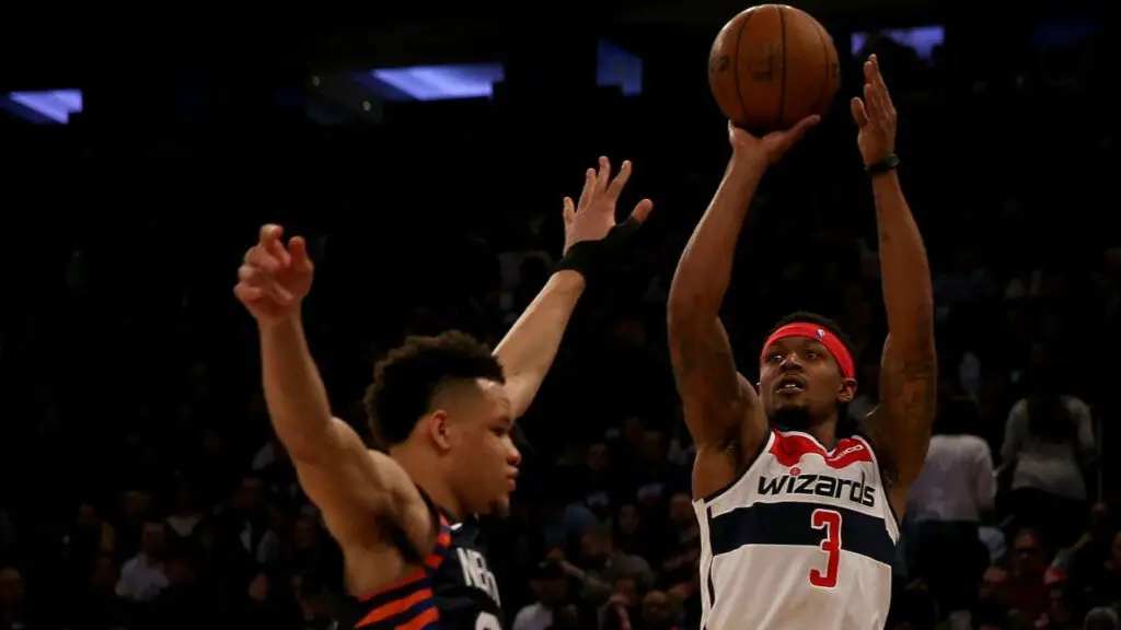 Washington Wizards star Bradley Beal attempts a jump shot over Kevin Knox against the New York Knicks