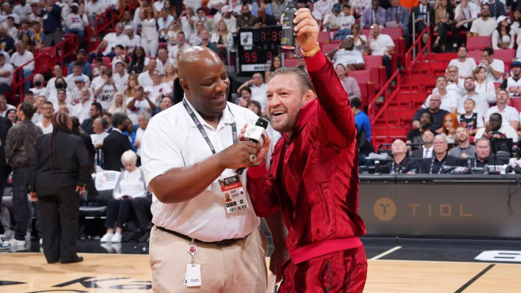 Conor McGregor speaks during a half-court appearance during halftime of Game Four of the 2023 NBA Finals between the Denver Nuggets and Miami Heat