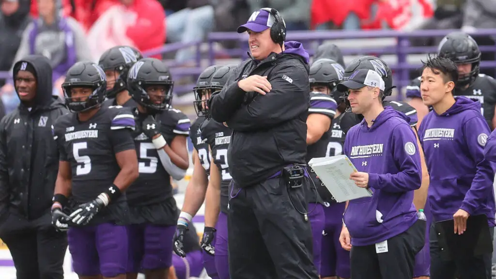 Former Northwestern Wildcats head coach Pat Fitzgerald reacts against the Ohio State Buckeyes during the first half
