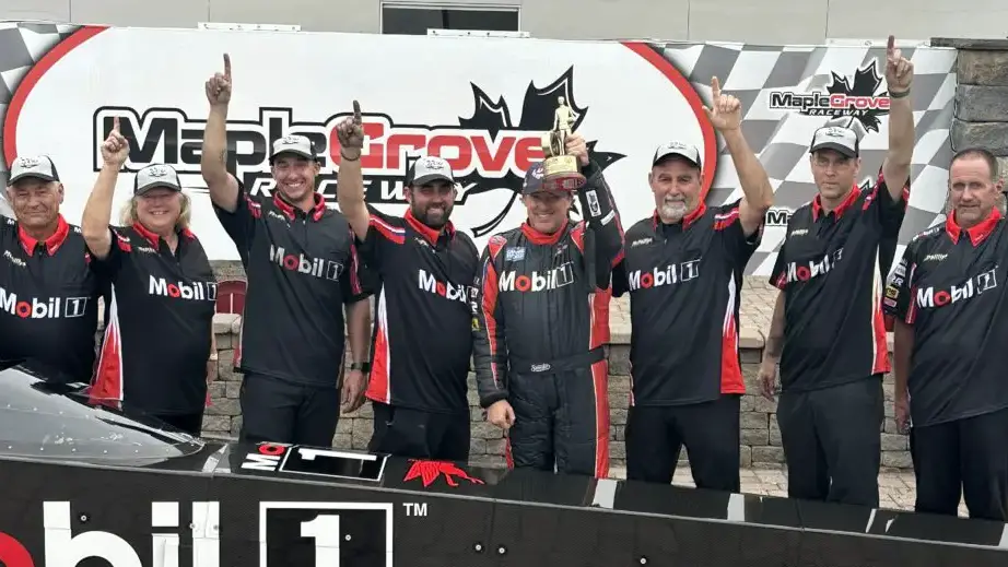 McPhillips Racing Top Alcohol Dragster driver Tony Stewart celebrates his Maple Grove Divisional win at Maple Grove Raceway