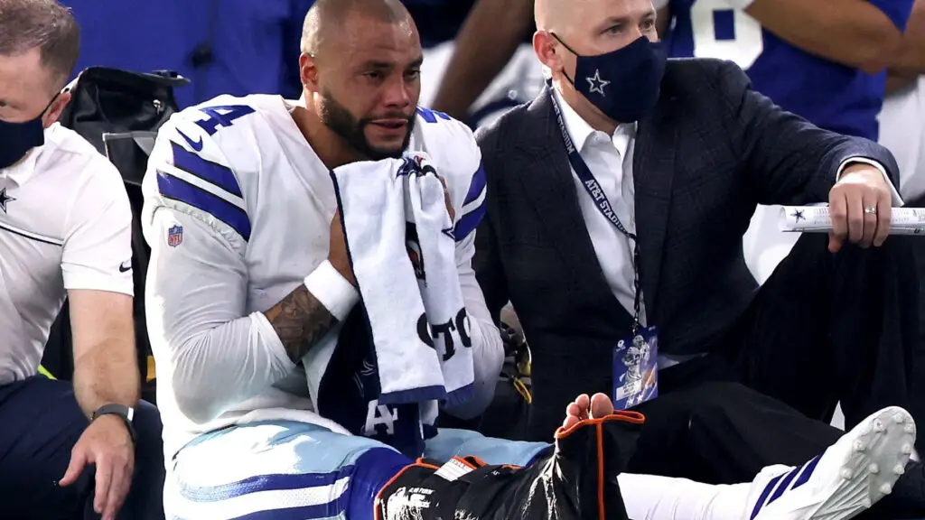 Dallas Cowboys quarterback Dak Prescott is carted off the field after sustaining a leg injury against the New York Giants during the third quarter