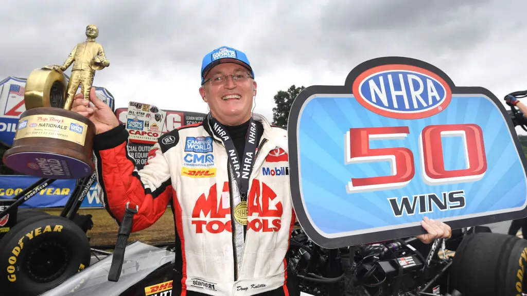 Mac Tools Top Fuel Dragster driver Doug Kalitta celebrates his win at the Pep Boys NHRA Nationals
