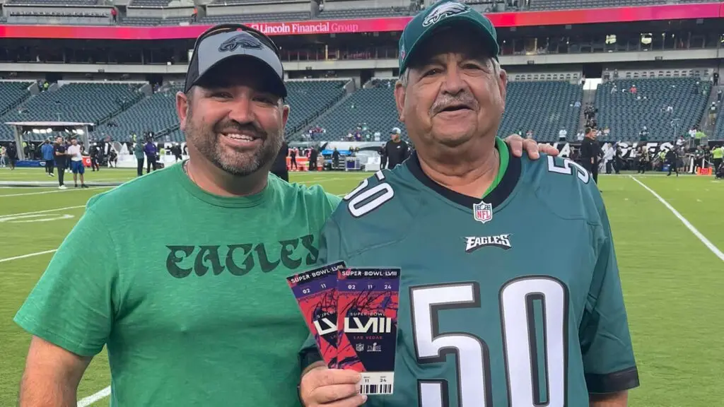 Legendary Florence High School football coach Joe Frappolli with his son Joe Frappolli Jr. after being presented with Super Bowl LVIII tickets