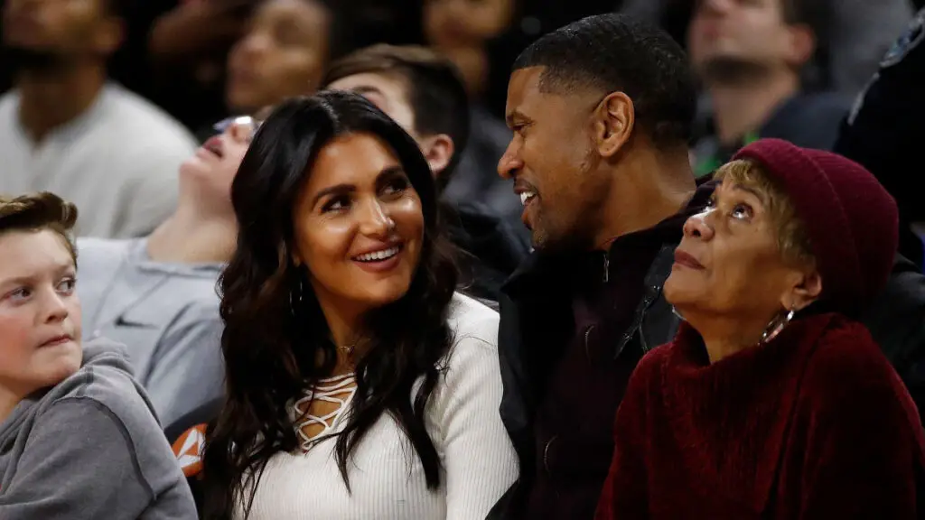 ESPN couple Molly Qerim and Jalen Rose watch the Golden State Warriors play the Detroit Pistons