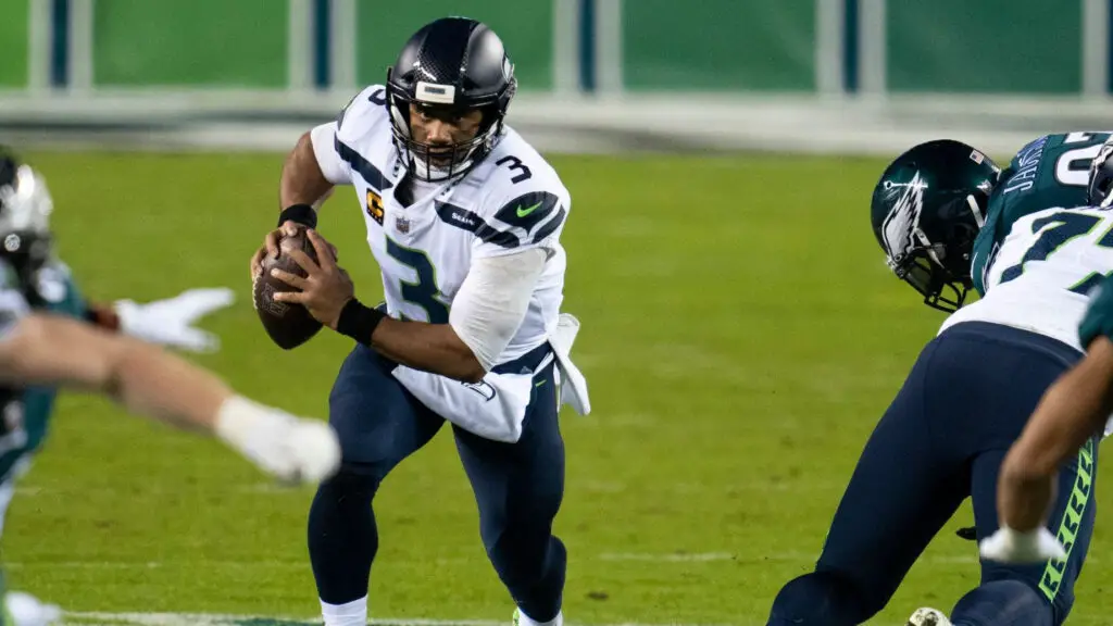 Seattle Seahawks quarterback Russell Wilson scrambles in the pocket during an NFL game against the Philadelphia Eagles