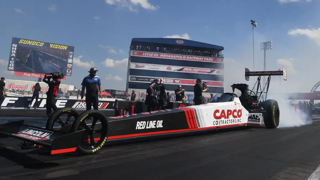 Capco Contractors Top Fuel Dragster driver Steve Torrence does a burnout before a pass at the 69th annual Dodge Power Brokers U.S. Nationals