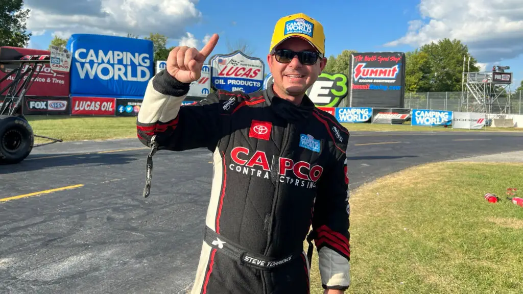 Torrence Racing Top Fuel Dragster driver Steve Torrence celebrates his No. 1 qualifier at the Dodge Power Brokers U.S. Nationals