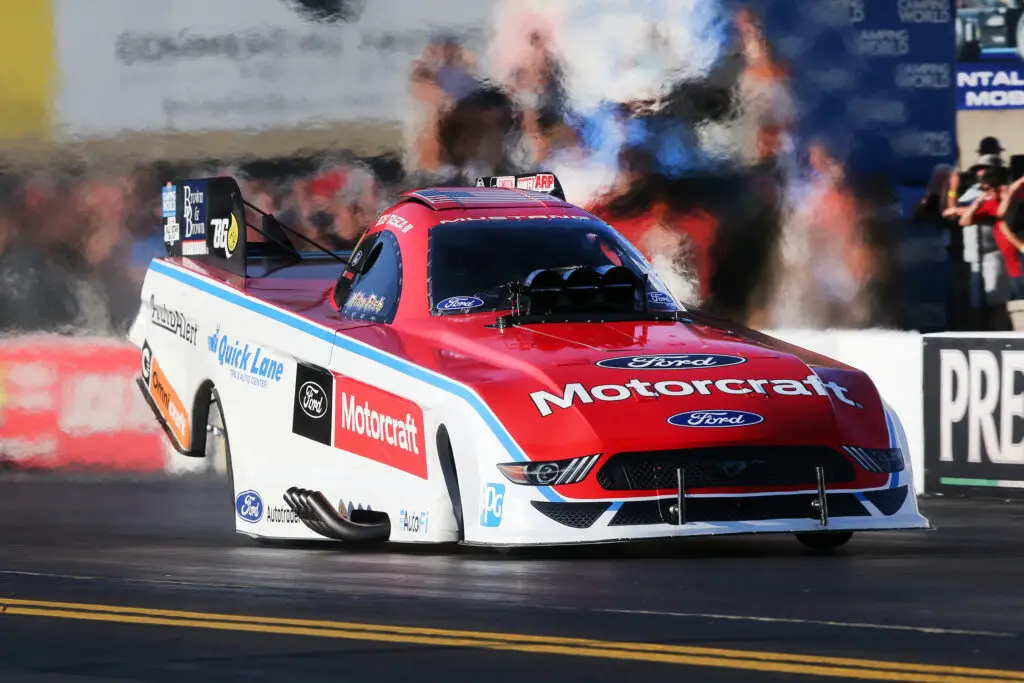Ford Motorcraft/Quick Lane Funny Car driver Bob Tasca III makes a pass on Saturday during the Pep Boys NHRA Nationals at Maple Grove Raceway