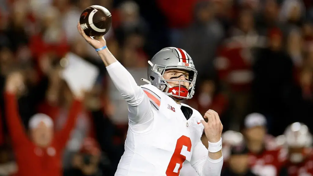Ohio State Buckeyes quarterback Kyle McCord throws a pass during the first quarter against the Wisconsin Badgers