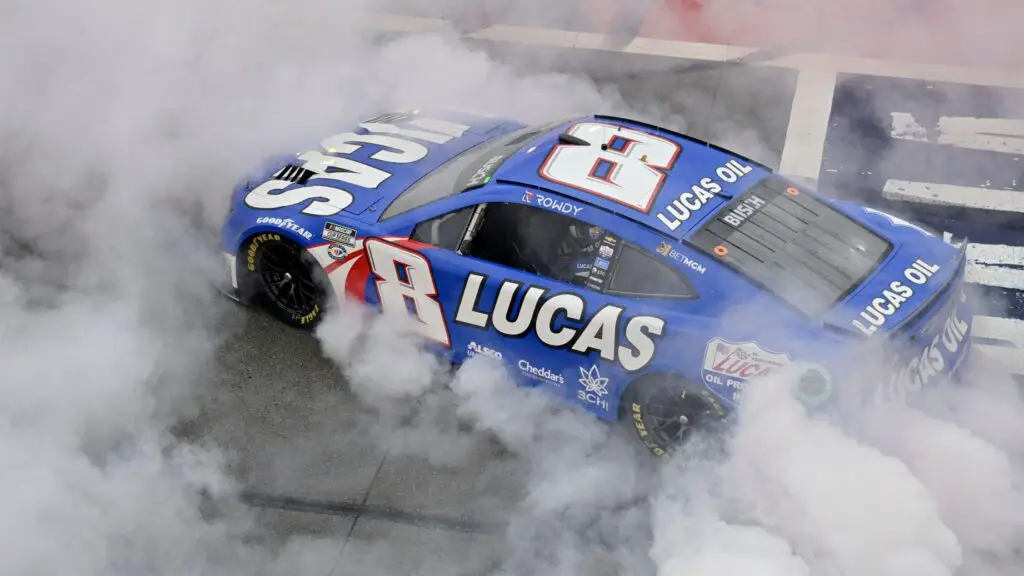 NASCAR Cup Series driver Kyle Busch celebrates with a burnout after winning the NASCAR Cup Series Pala Casino 400 at Auto Club Speedway