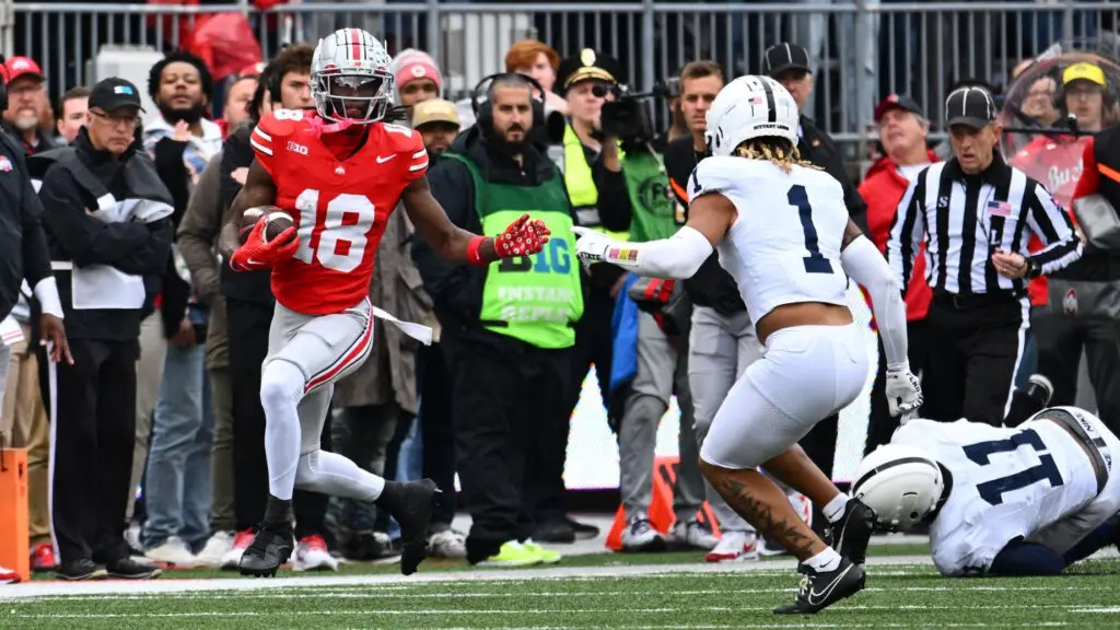 Ohio State Buckeyes wide receiver Marvin Harrison Jr. runs with the ball during the fourth quarter of a game against the Penn State Nittany Lions