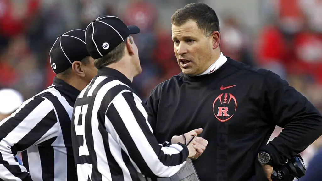 Rutgers Scarlet Knights head coach Greg Schiano talks to officials during the New Era Pinstripe Bowl against the Iowa State Cyclones