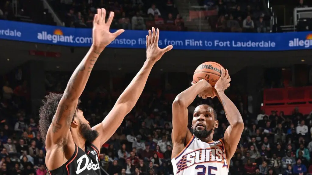 Phoenix Suns star Kevin Durant shoots the ball during the game against the Detroit Pistons