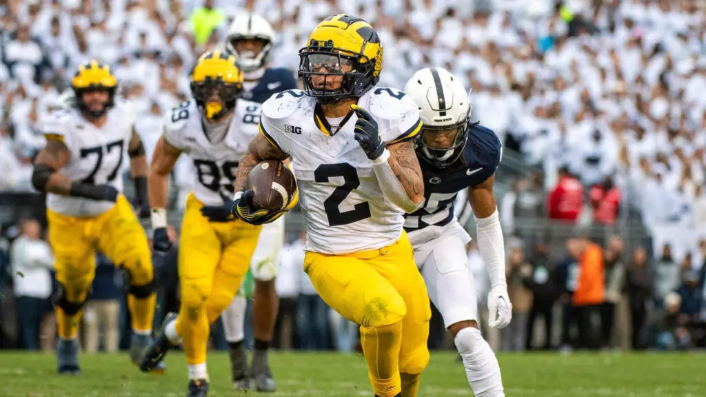 Michigan Wolverines running back Blake Corum runs with the ball for a touchdown during the second half of a college football game against the Penn State Nittany Lions