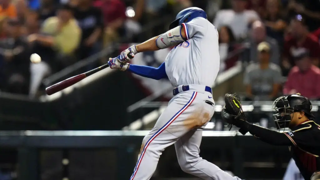 Texas Rangers star Marcus Semien hits a two-run home run in the third inning during Game 4 of the 2023 World Series between the Texas Rangers and the Arizona Diamondbacks