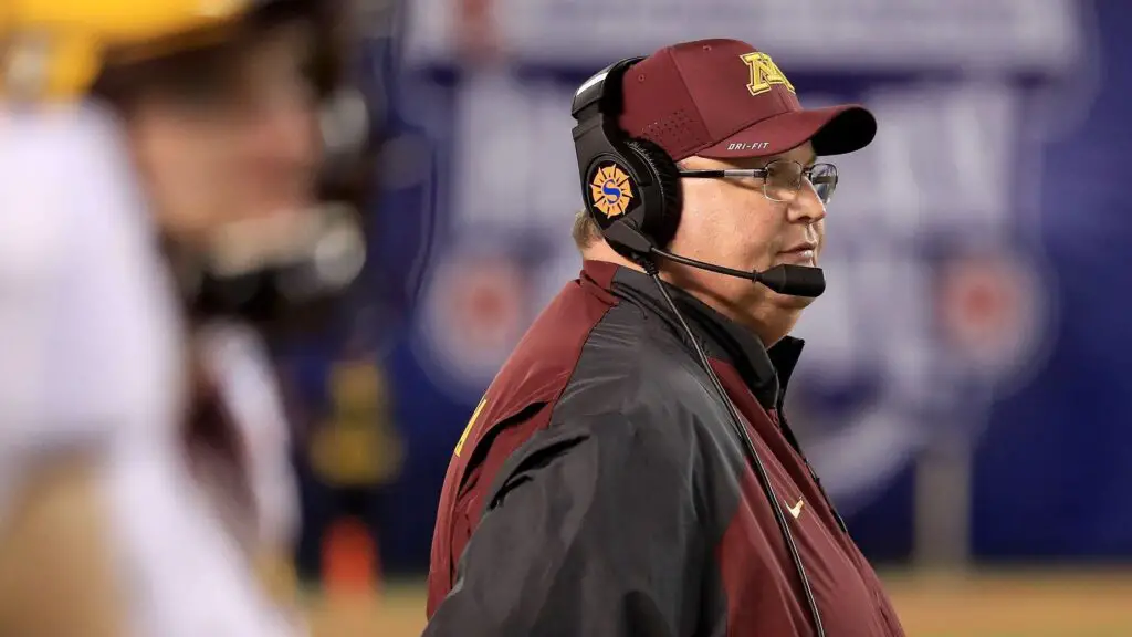 Former Minnesota Golden Gophers head coach Tracey Claeys looks on from the sideline during the second half of the Holiday Bowl against the Washington State Cougars