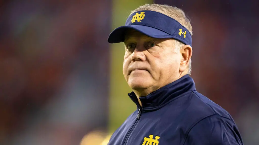 Former Notre Dame Fighting Irish head coach Brian Kelly looks on before the game against the Virginia Tech Hokies