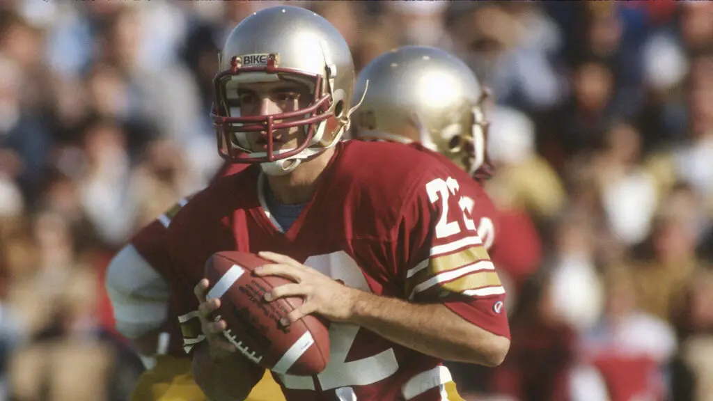 Former Boston College Eagles quarterback Doug Flutie drops back to pass against Penn State Nittany Lions during an NCAA College football game