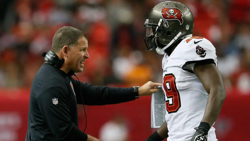 Tampa Bay Buccaneers head coach Greg Schiano converses with Mike Williams during the game against the Atlanta Falcons