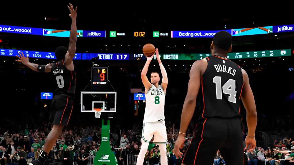 Boston Celtics star center Kristaps Porzingis shoots the ball during the game against the Detroit Pistons