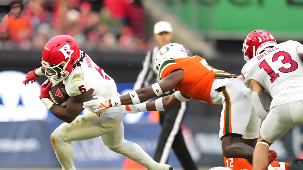 Rutgers Scarlet Knights running back Kyle Monangai carries the football against the Miami Hurricanes during the Bad Boy Mowers Pinstripe Bowl
