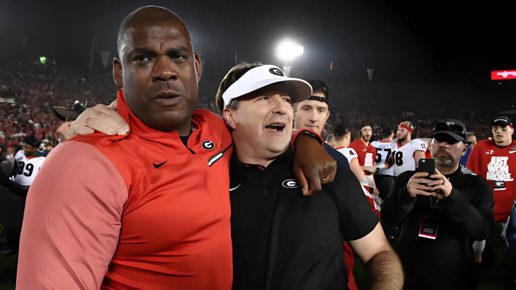 Georgia Bulldogs head coach Kirby Smart and defensive coordinator Mel Tucker celebrate after the Bulldogs victory in the College Football Playoff Semifinal at the Rose Bowl Game between the Georgia Bulldogs and Oklahoma Sooners