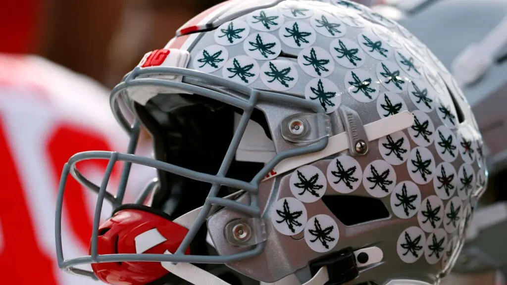 An Ohio State Buckeyes football helmet on the sidelines during a college football game against the Rutgers Scarlet Knights