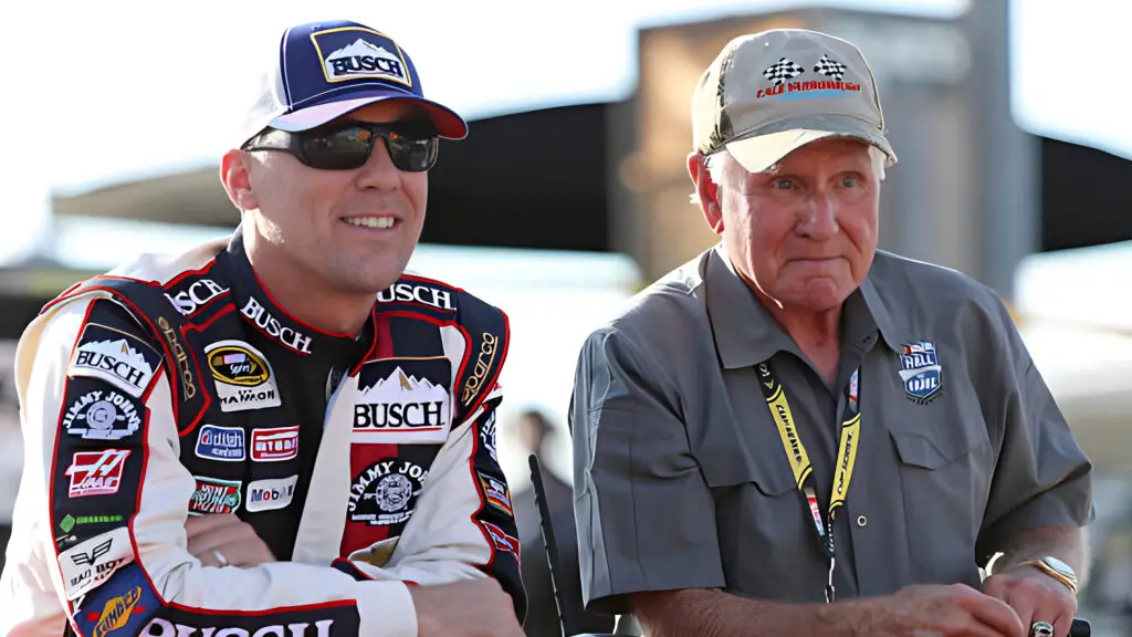 Former NASCAR driver Kevin Harvick rides with NASCAR Hall of Famer Cale Yarborough during pre-race festivities for the NASCAR Sprint Cup Series Bojangles' Southern 500