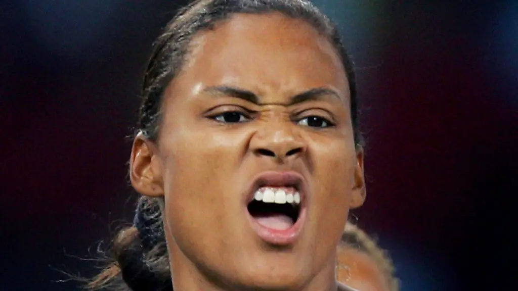US 4x100 relay team member Marion Jones makes a face after her team failed to win a medal in the women's 4x100 relay race