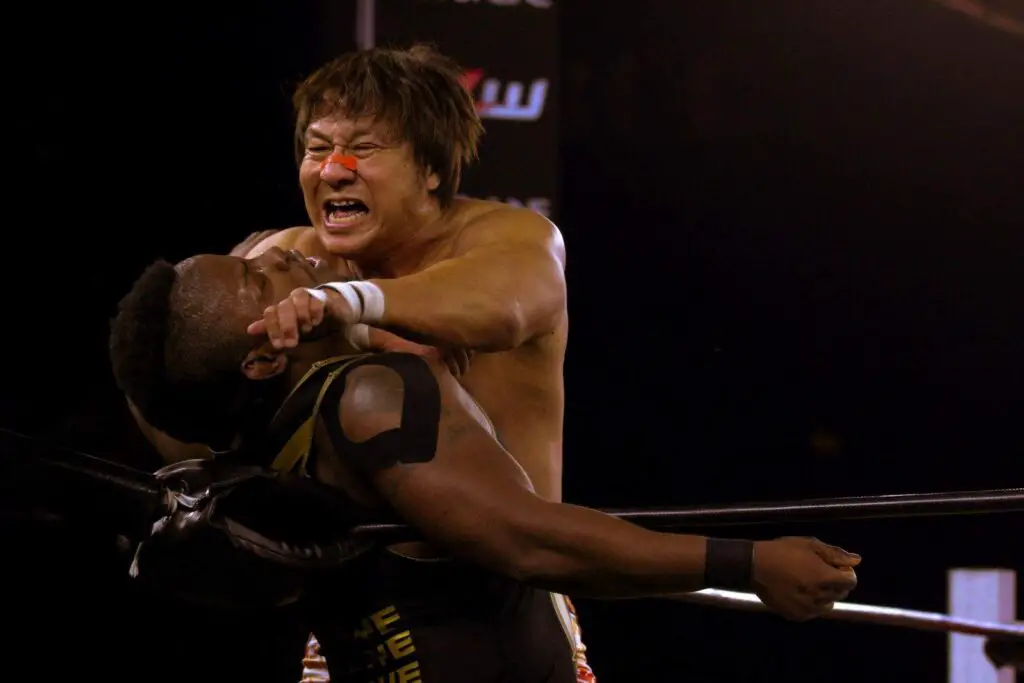 Major League Wrestling fighter Satoshi Kojima has former champion Alex Kane in the corner during their match