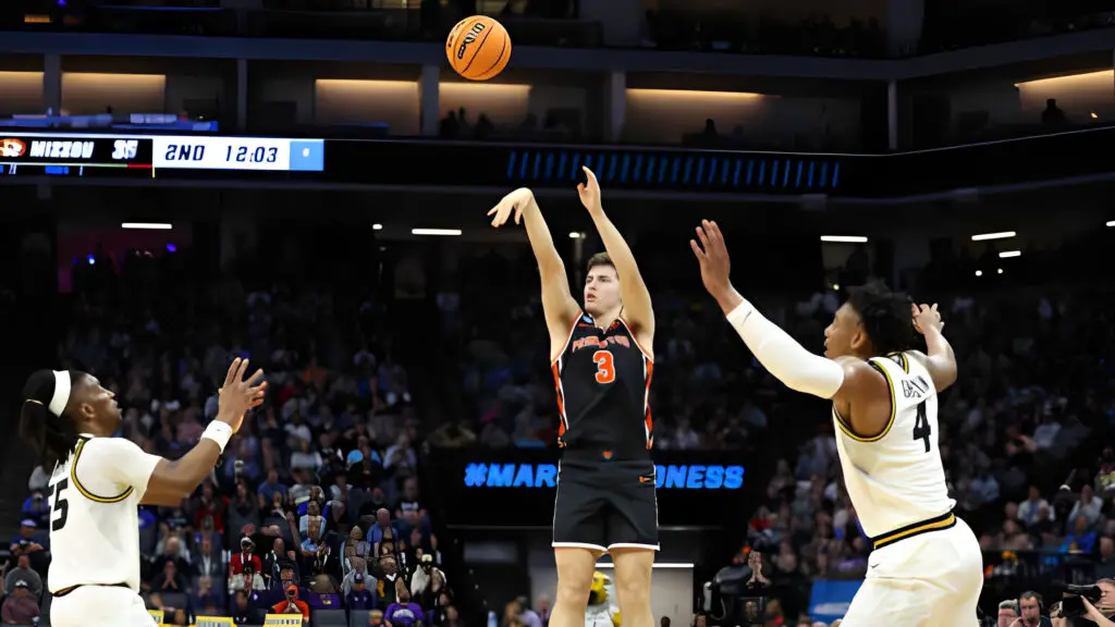 Princeton Tigers player Ryan Langborg shoots a three-point basket during the second half against the Missouri Tigers in the second round of the NCAA Men's Basketball Tournament