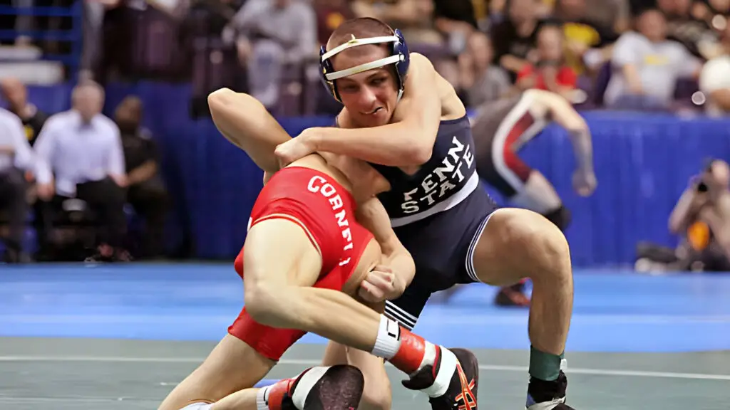 Penn State Nittany Lions wrestler Nicholas Megaludis wrestles Cornell Big Red's Frank Perrelli in the 125-pound semi-final match during the NCAA Wrestling Championships