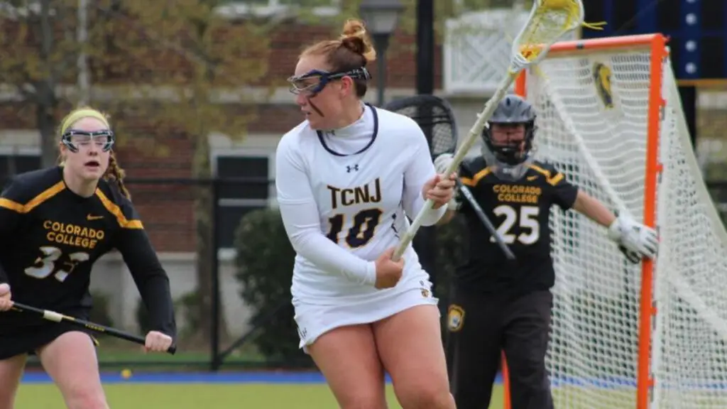 TCNJ Lions Graduate Student Attacker Katherine Naiburg looks to make a play against the Colorado College Tigers