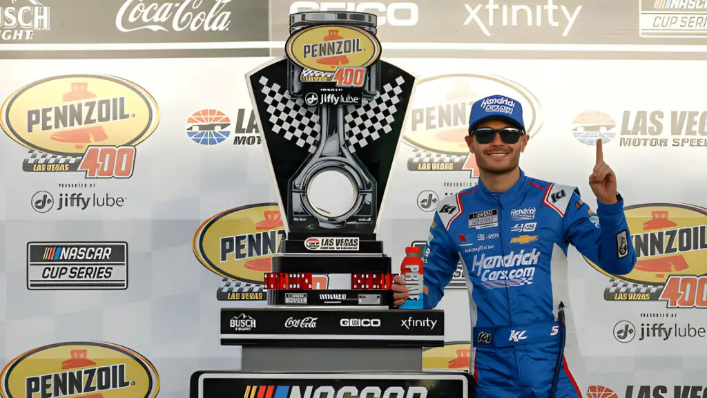 NASCAR Cup Series driver Kyle Larson celebrates in victory lane after winning the Pennzoil 400