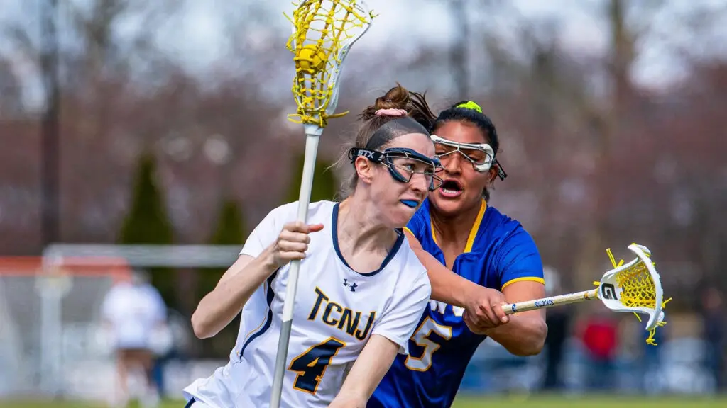 The College of New Jersey Lions attacker Natalie Berry looks to make a play in a game