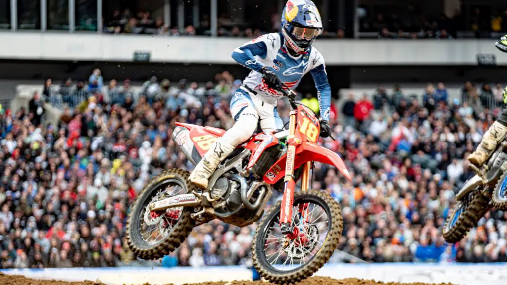 Supercross rider Jett Lawrence attempts to make a jump during the 450 SX race