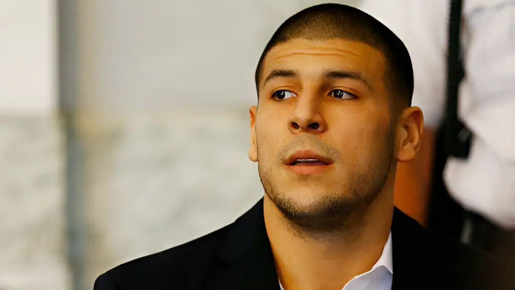 Aaron Hernandez sits in the courtroom of the Attleboro District Court during his hearing