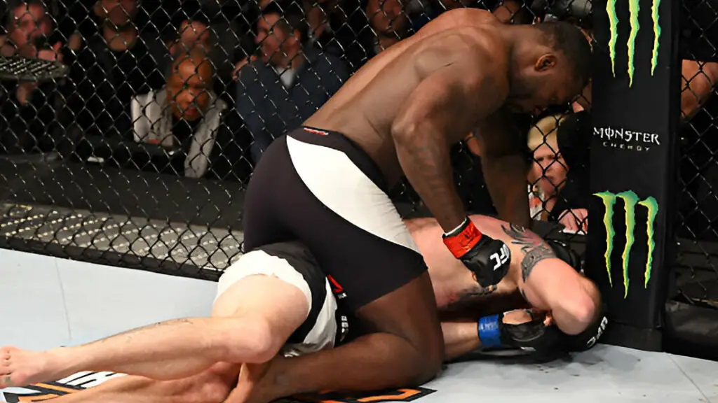 UFC fighter Anthony Johnson punches Ryan Bader in their light heavyweight bout during the UFC Fight Night event