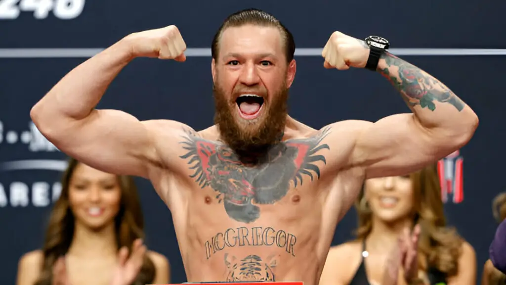 UFC Welterweight fighter Conor McGregor poses on the scale during a ceremonial weigh-in for UFC 246
